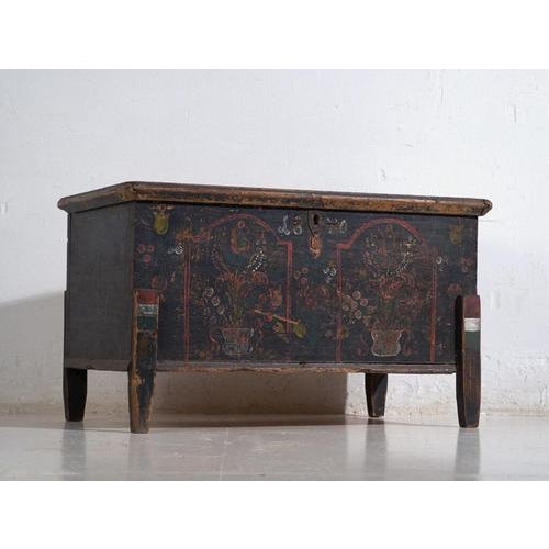 This antique solid pine wood trunk from Central Europe, dating to c.1870 represents the practical domestic furniture...