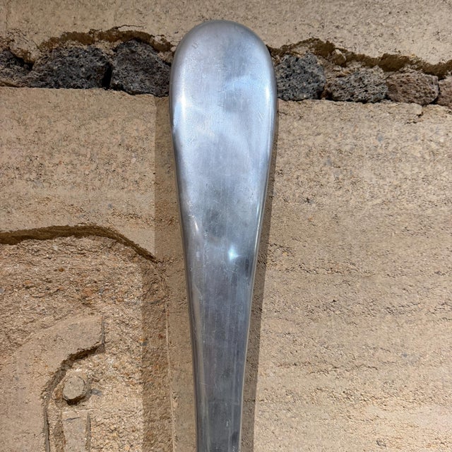 For your consideration, an oversized, silver-toned aluminum spoon and fork. A large-scale wall sculpture set. These mid-...
