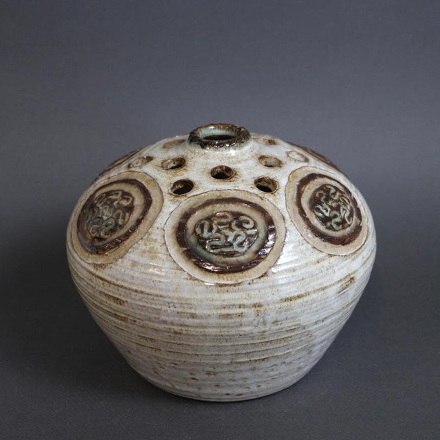 Mid-century decorative ceramic flower holder (circa 1960s) by Marcel Giraud, Vallauris, France. A delightful creation with...