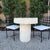 This stunning handcrafted outdoor limestone table, measuring 31" in diameter and standing 32" tall, this embodies the...