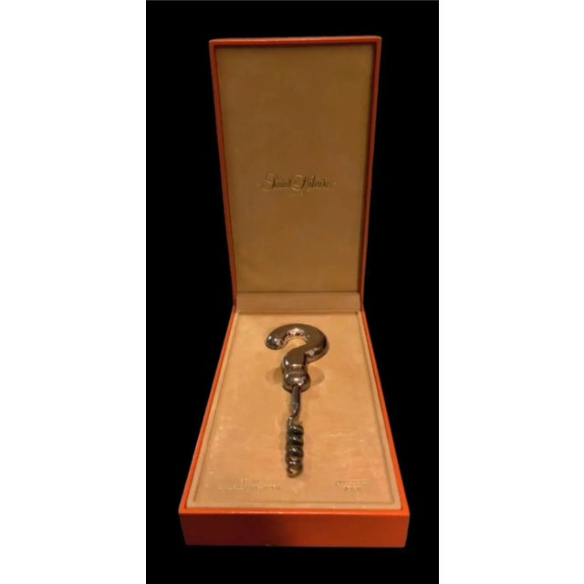 This is a rare French corkscrew by Saint Hilaire Paris. The handle is designed in the shape of a question mark. The...