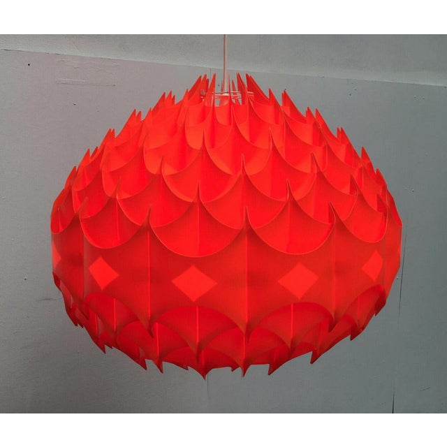 Imposing pendant lamp from the Austrian manufacturer Vest to a design by Milanda Havlova from the 1960s. Through their...
