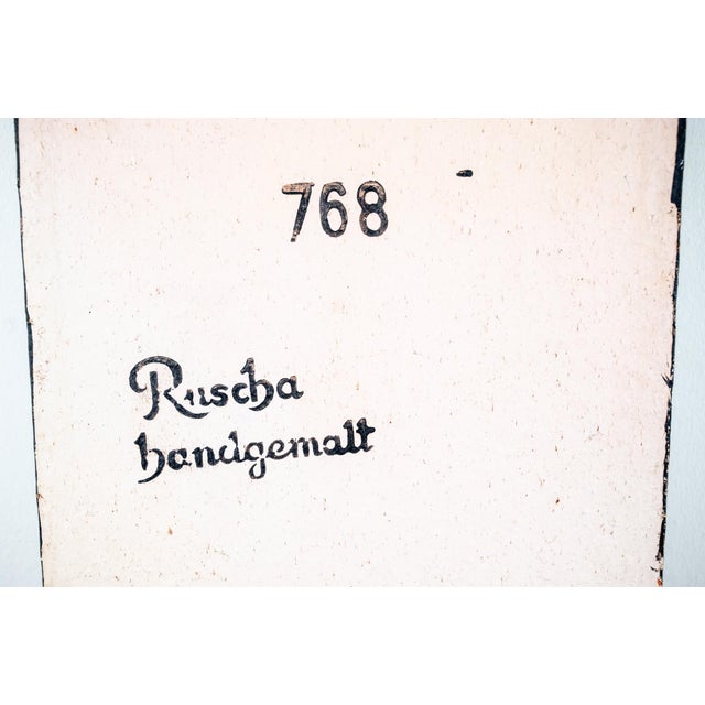 Bring bold mid-century character to your space with this striking hand-painted ceramic wall plaque by Ruscha Keramik of...