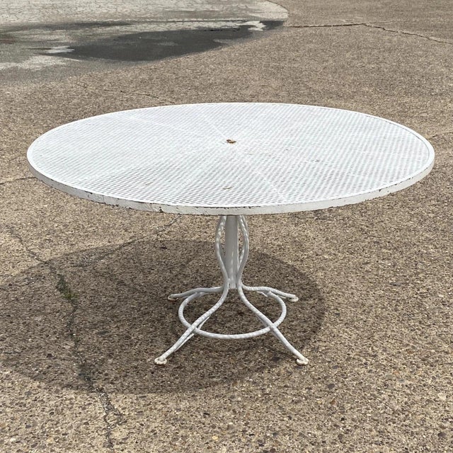 Vintage Russell Woodard Sculptura Mid Century Modern 53" Round Wrought Iron Patio Dining Table. Circa Mid 20th Century....