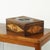 Beautiful storage box made of pine with decorative carvings. The eagle on the inside of the lid is special. The box dates...