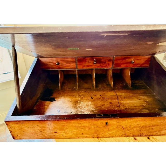 Antique Early 19th Century English Georgian Mahogany Shopkeeper’s Writing Slope Desk. Dates from 1780-1810, replete with...