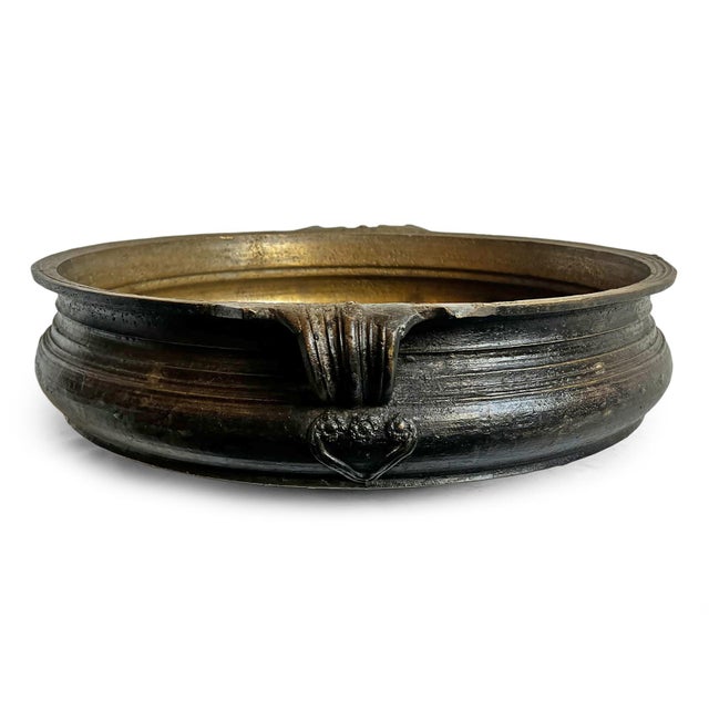 Antique solid bronze Urli bowl from India. These traditional bowls were used in Indian culture for rituals and festivals,...
