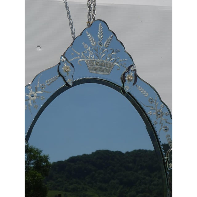 Magnificent vintage mirror from the mid-20th century, in the Venetian style. This exceptional piece is distinguished by...