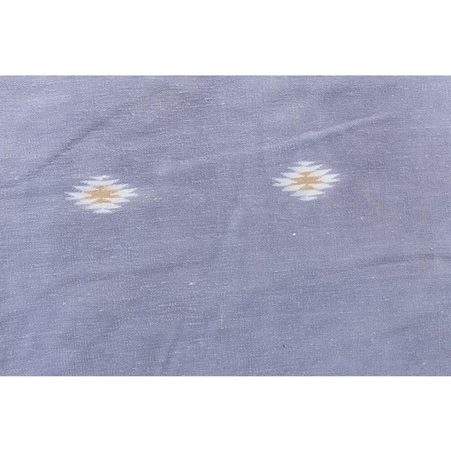 This elegant 1950s Indian Dhurrie rug embodies the quiet sophistication and balanced geometry characteristic of mid-...