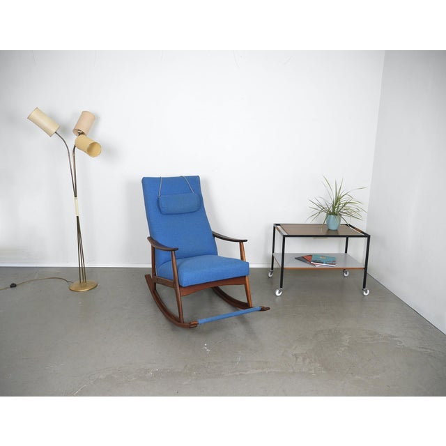 Floor lamp from the 1950s. The floor lamp is made of brass and features three adjustable gooseneck lamps. The shades are...