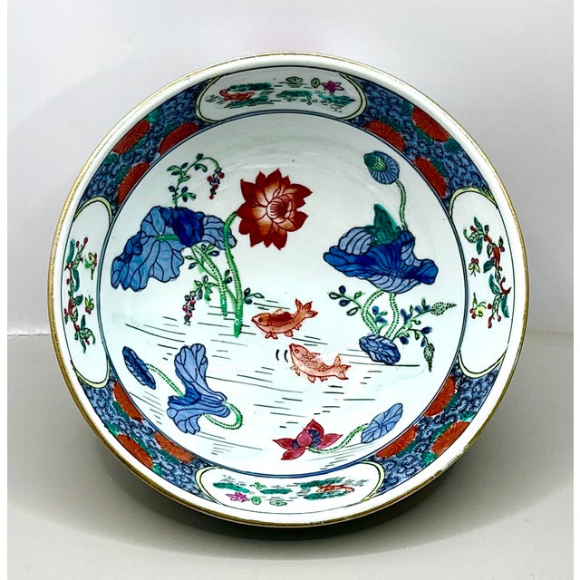 Vintage, hand-painted Macau Floral Bowl with gilt trim. Graceful, hand-painted ceramic bowl from Macau, measuring...