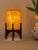 Comet pairs a hand-carved Egyptian alabaster shade with a geometric walnut base, combining contemporary form with...