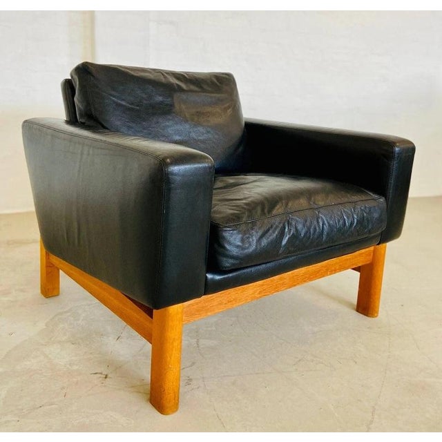 A superb vintage danish lounge chair designed by renowned danish designer poul m. Volther and manufactured by erik...