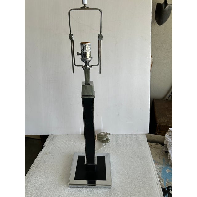 Beautiful Ralph Lauren Classic Desk / Table Lamp. Polished Silver Chrome Finish with stitched Leather Shaft. This Lamp...