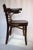 As identified underneath the saddle, this piece was produced in the United States by Thonet Industries during the era...