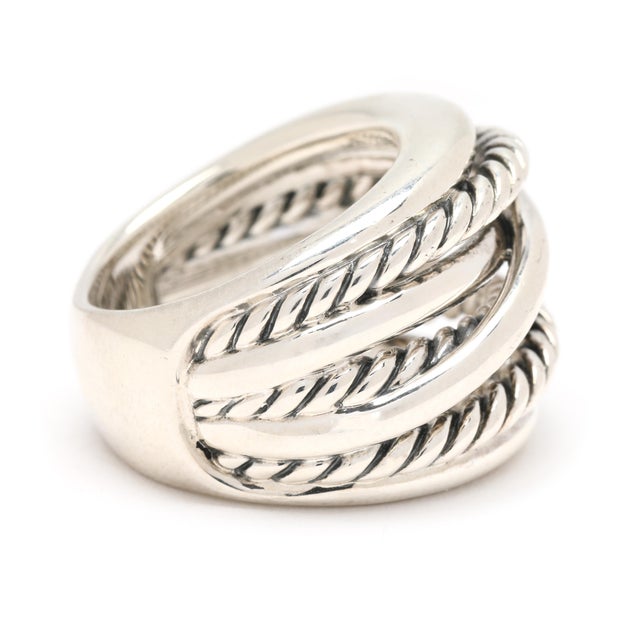 Ring Size: 6.75 Rise Off Of Finger: 6.6 mm Width: 18.1 mm Weight: 11.5 dwts/ 17.9 grams Metal: "925 DY" Crossover SKU:...