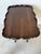 Elegant antique French-style side table crafted in rich mahogany, featuring a distinctive serpentine scalloped gallery top...