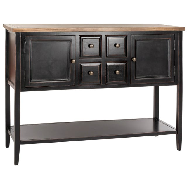 The sideboard by is a godsend for those in dire need of extra storage. With a soft black distressed finish and weathered...