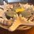 Shell Curated Maritime Still Life: An Assemblage of Pristine Specimen Seashells and Starfish in Woven Tray For Sale - Image 7 of 8