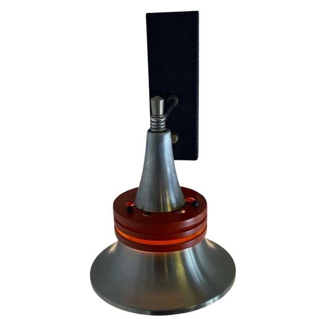 Vintage space age design wall mounted lamp. Comes with an on/off switch mounted on the base. The inside is a shade of...
