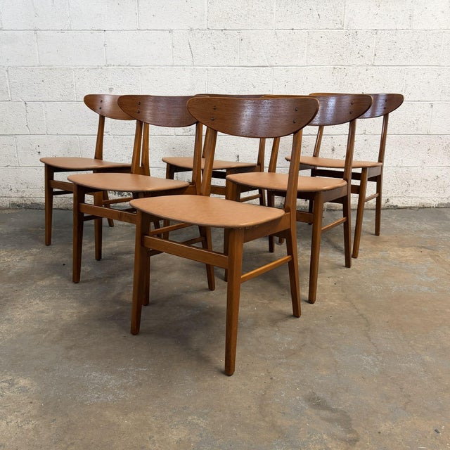 A set of six Danish teak dining chairs designed by Thomas Harlev for Farstrup, Model 210, dating to the 1960s. The chairs...