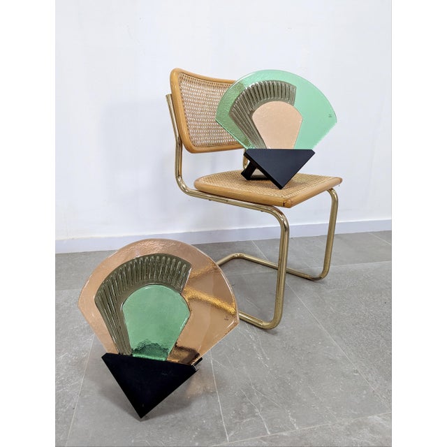 Pair of Vetri Murano wall sconces crafted from hand-molded Murano glass with a striking geometric aesthetic, Italy, 1980s....