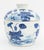 Chinese Blue and White Porcelain Covered Jar, hand-painted with lotus flower motif. 10.5" H x 9.75" Diameter. Provenance:...
