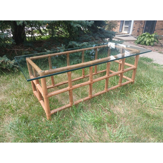 Vintage Rectangular Bamboo wood, glass top coffee table, circa 1970's. Sturdy, strong and attractive. Thick heavy glass.