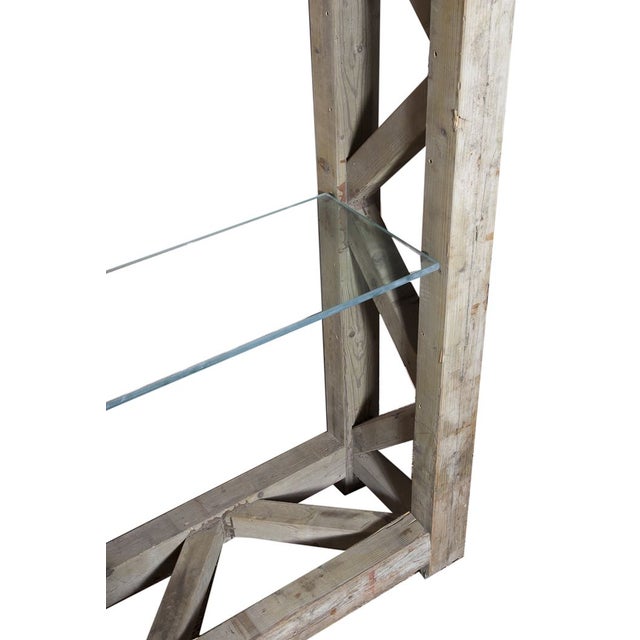 Showcase your books, and decorative items with this stunning wood and glass bookcase. The wooden frame is constructed out...