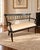 An elegant vintage settee by Maitland-Smith, featuring a dramatic black lacquered frame accented with hand-applied gilt...