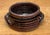 Celebrate the beauty of handcrafted pottery with this vintage striped stoneware bowl, a charming decorative vessel that...