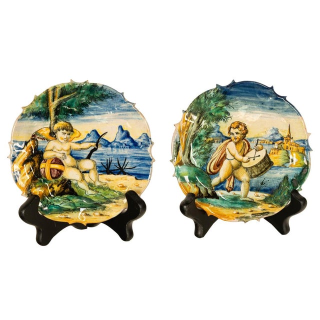 A fine and early pair of antique Italian Cantagalli maiolica (majolica) hand-painted Istoriato plates, Florence, Italy,...