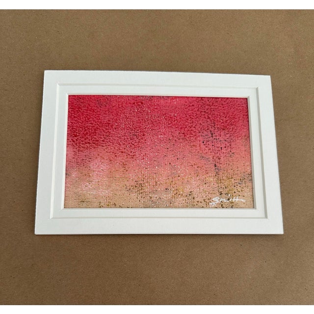 An original abstract work exploring the subtle transition between warm blush pink, dusty rose, soft peach, and muted...