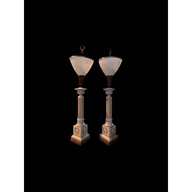 Elegant and timeless, this pair of vintage Corinthian column table lamps showcases classic Neoclassical design with...