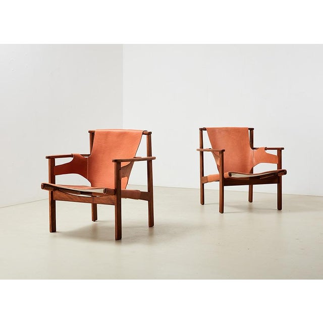 Pair of Trienna lounge chairs, designed by the Swedish architect Carl-Axel Acking in 1957. It was presented at the Milano...