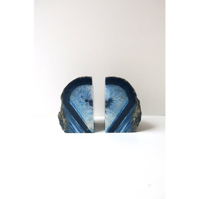 A beautiful and substantial pair of cobalt blue agate bookends or decorative objects, circa late-20th century, Brazil....