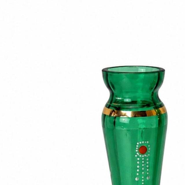 Glass and Crystal - Pair of jugs. European; early 20th century, molded glass in shades of green and gold. Height: 11.5 cm.