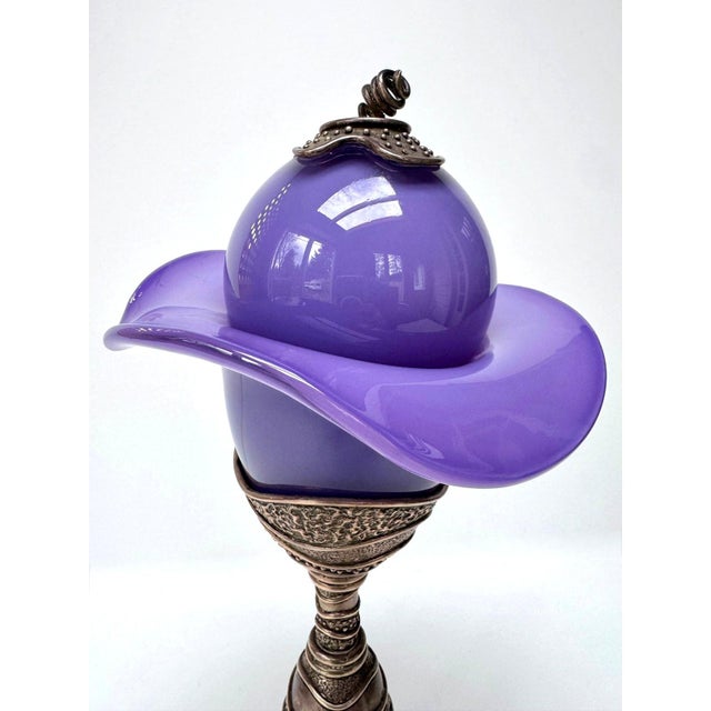 Signed studio glass sculpture titled “Flower Ball” by American artist John Ruth, executed in the 1990s. This sculptural...