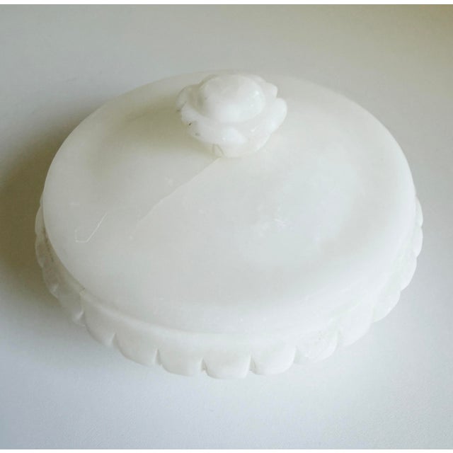 A vintage Italian hand-carved white alabaster lidded dish, measuring 8" in diameter and 4" high. Made in the 1950s to...