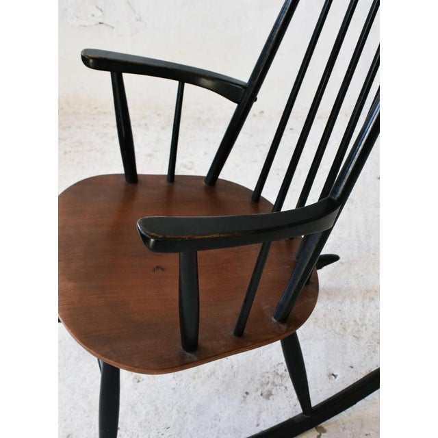 A beautiful Scandinavian Modern rocking chair designed by Ilmari Tapiovaara and manufactured by Asko in Finland during the...