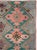 A vintage Turkish Anatolian small throw rug handmade during the mid-20th century. Measures: 3' 5" x 4' 11".