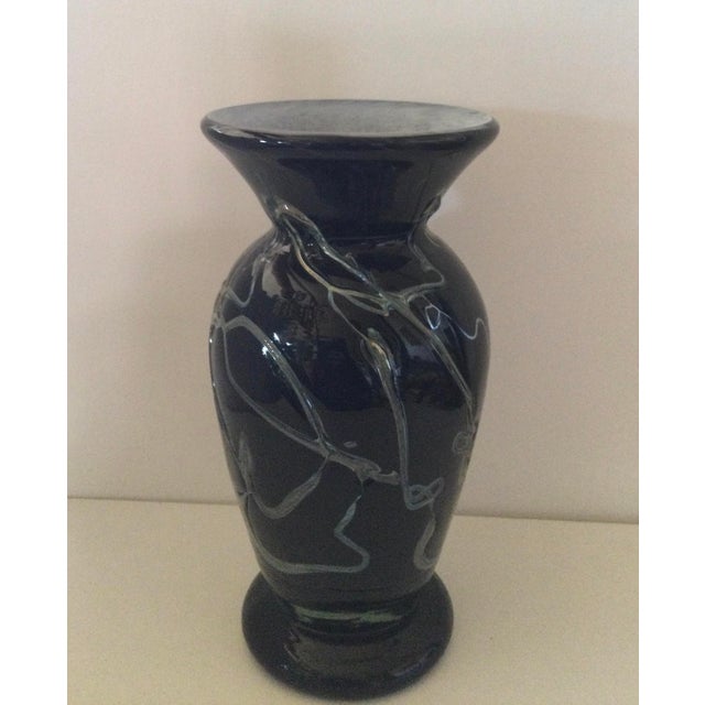 Vase made entirely by hand, using the three-layer blown glass technique. First layer: opaline white; second layer: deep...