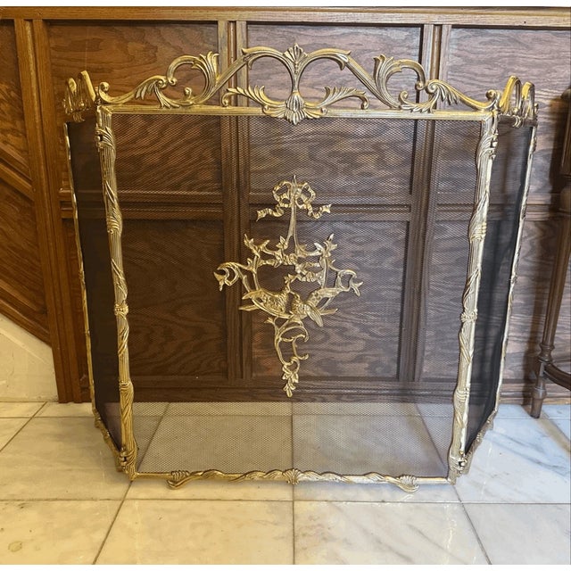 24” wide center part 30” high 11” each side Good condition Elevate your hearth with this stunning, 3-panel fireplace...