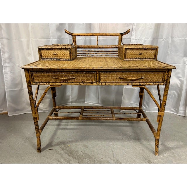 Beautiful vintage burnt bamboo rattan pagoda desk with chair to float in your space. Chair 37.5"tall x 17"wide x 20.5"deep...
