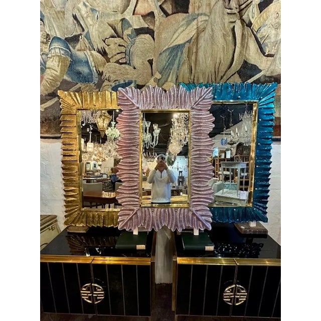 Gorgeous modern soft lavender glass and brass mirror. Sure to make a statement!