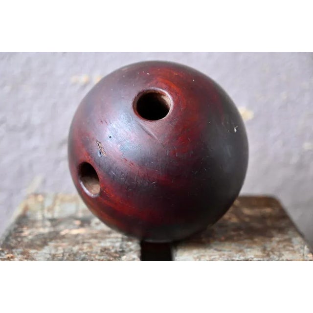 with its pronounced chandelier, there is no doubt that this old ball overthrew multiple skittles. Made of hard, dense,...