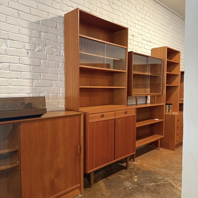 Vintage mid-century modern two-piece teak and glass drinks bookcase attributed to Bertil Fridhagen for Bodafors Möbler,...