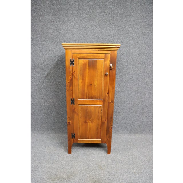 Stain over pine primitive chimney cupboard.