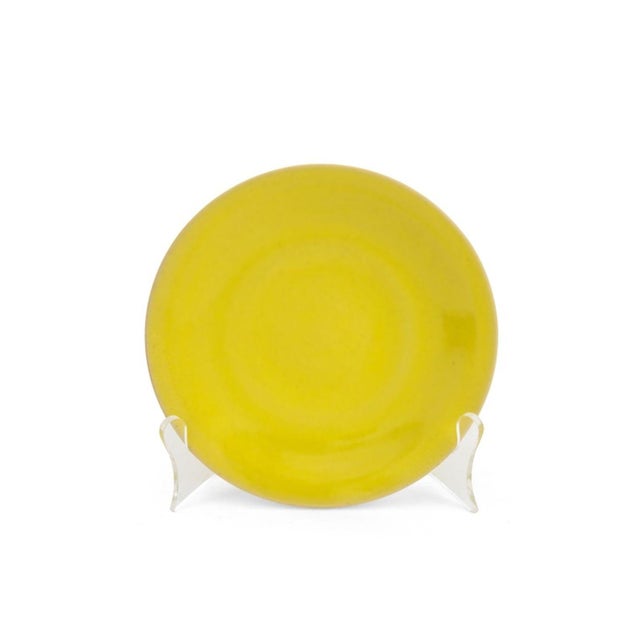 Set of Eight Rupert Spira (English, b. 1960) Yellow Glazed Stoneware Bread and Butter Plates, marked "RS" to the...