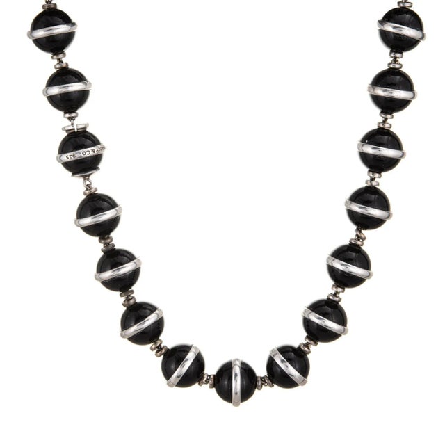 This is part of Chairish’s Costume Jewelry assortment. Stylish and finely detailed vintage Tiffany & Co onyx necklace,...